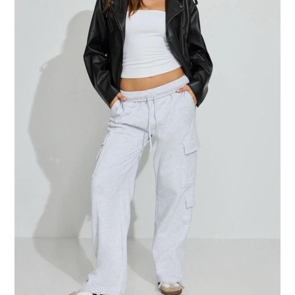 Trendy Black Leather Jacket with White Cargo Pants